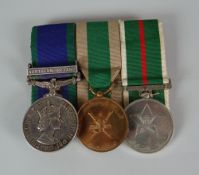 A QE II TRIO mounted together and comprising For Campaign Service with Northern Ireland clasp