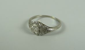 AN ANTIQUE 18k WHITE GOLD & PLATINUM DIAMOND CLUSTER RING, 2.3gms