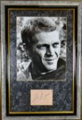 STEVE MCQUEEN AUTOGRAPH on autograph book page enclosed with a photographic print of the actor,