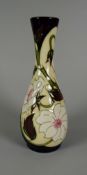 A 2007 RARE MOORCROFT NARROW NECK VASE in the Yorkshire pattern, (no.53), by Sian Leeper, 21cms