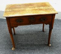 A NINETEENTH CENTURY OAK LOWBOY with single frieze drawer with brass escutcheon and handles, all