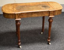 A VICTORIAN BURR WALNUT & MARQUETRY WRITING DESK having a hinging tooled leather top flanked by