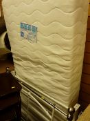 Metal framed single bed and mattress