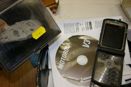 Boxed Motorola Razor mobile phone, a bubblepacked Millennium Falcon model etc