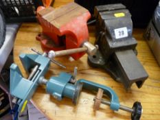 Three small bench vices
