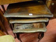 Set of three reproduction mahogany glass topped tables