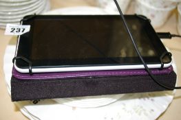 Android powered tablet with charger (appears in working order) E/T