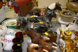Four model pottery shire horses including one Beswick and other horses