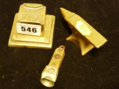 Miniature brass anvil on stand and a cigar cutter