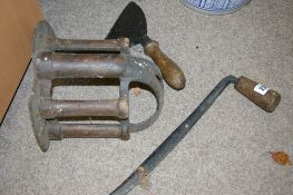 Vintage wall mountable saddle rack and a similar era twin handled shaving tool