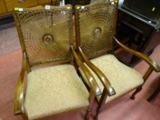 Pair of polished vintage Bergere back armchairs