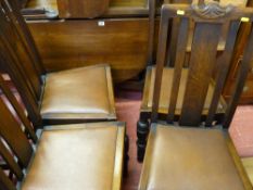 Oak gate leg dining table and a set of four highback chairs with drop-in padded seats