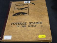 'The Wonderer' stamp album with quantity of worldwide stamps