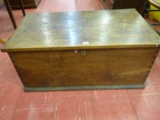 AN ANTIQUE OAK LIDDED CHEST with interior candle tray and iron strap hinges and lock, dovetail