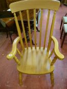 A MODERN SOLID PINE GRANDFATHER'S ARMCHAIR, 116 cms high, 61.5 cms wide