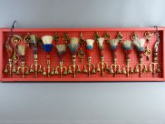 SHIRE/HEAVY HORSE BRASSWARE - a 4ft wide display board housing a good collection of fourteen