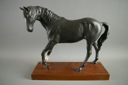 A BESWICK POTTERY MATT FINISH STANDING HORSE 'Black Beauty', white ankle to right leg, white flash