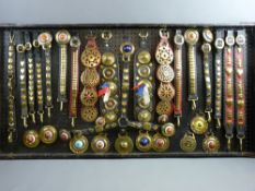 SHIRE/HEAVY HORSE BRASSWARE - a 4ft display board mounted with an excellent array of nose bands,