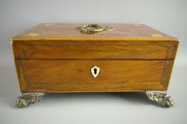 A REGENCY MAHOGANY & CROSSBANDED ROSEWOOD BOX having a decorative ring pull lid handle and satinwood