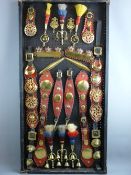 SHIRE/HEAVY HORSE BRASSWARE - a 4ft display board of excellent arrangements of harness decorations