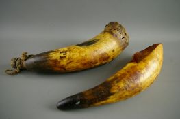 TWO BONE CONTAINERS used for containing various materials for sharpening blades in the field
