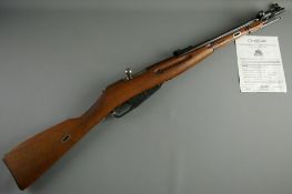 A DE-ACTIVATED USSR 7.62mm MOISIN NAGANT CARBINE serial no. KC08213, dated 1952, three quarter
