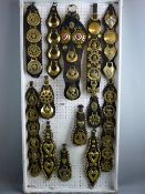 SHIRE/HEAVY HORSE BRASSWARE - a 4ft display board containing thirteen martingales of royalty and