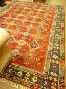 A LARGE EASTERN TUFTED WEAVE CARPET