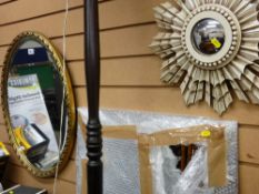 Oval gilt framed wall mirror, painted wood starburst convex mirror and an unframed piece of mirrored