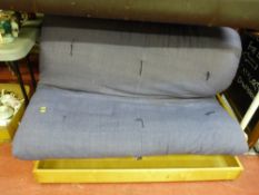 Modern pine and upholstered couch/bed with under storage tray