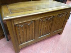 Good vintage oak blanket chest with linenfold carved front panels