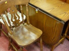 Oak effect twin flap gate leg dining table and a set of six farmhouse style dining chairs
