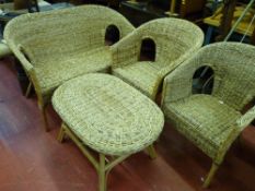 Good four piece canework conservatory suite of two seater settee, pair of armchairs and matching