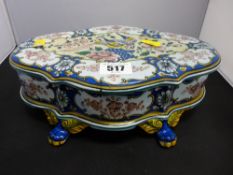 Maiolica style hand painted footed box and cover (chip to lid interior)
