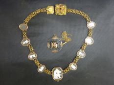 Aztec type pendant marked 'Old Cuzco' stamped 18K and 925 and a yellow metal multi-cameo necklace