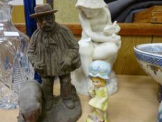 Vintage parian figure of a young girl holding a rabbit, a modern composite figure of an old