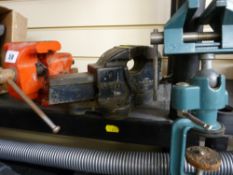 Three small bench vices