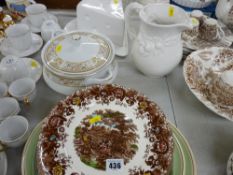 Quantity of decorative plates, a white pottery cheese dish with mouse decoration etc