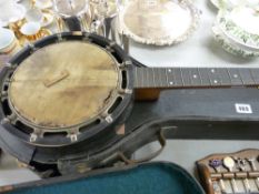 Cased vintage banjo with maker's label (for restoration)