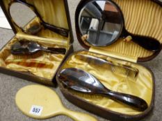 Ivorine hand mirror and two cased mirror and brush sets