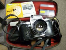 Miranda model F vintage camera and associated equipment in a carry case