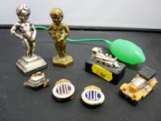 Two Pboy figure ornaments, three enamel lapel badges etc