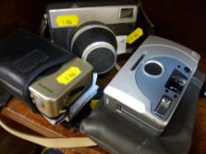 Two vintage pocket cameras and one other