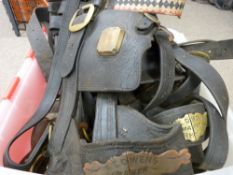 Shire/heavy horse leather work harnessing and tack, some having applied brass maker's labels,