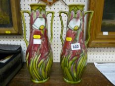 Pair of Minton Secessionist twin handled vases, no. 11 (three of the four handles broken and re-