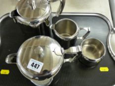 Stainless steel four piece teaset on a twin handled tray
