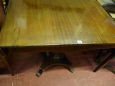 Mahogany and string inlaid sofa table on a segmented column and quatrefoil base