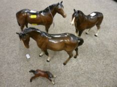 Three Beswick horse figurines and one other