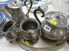 Four piece English pewter teaset and a small oval tray