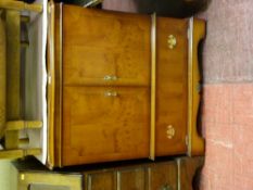 Yew wood two door entertainment cabinet